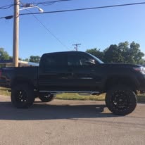 Toyota Tacoma after lift — side